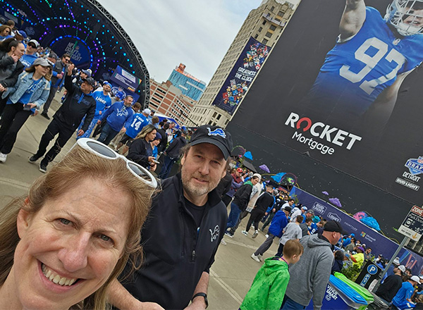 Susan McGraw takes selfie with husband at NFL Draft.