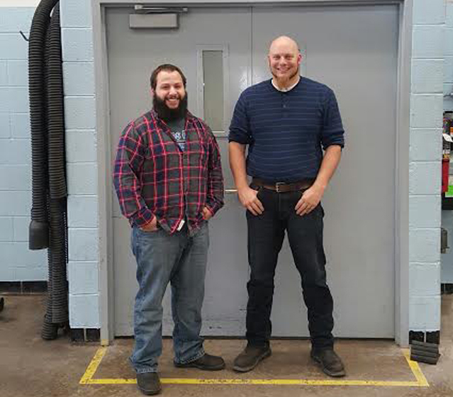 Robert Morantes (left) stands with ASSET Lead Instructor Kristopher Young. 