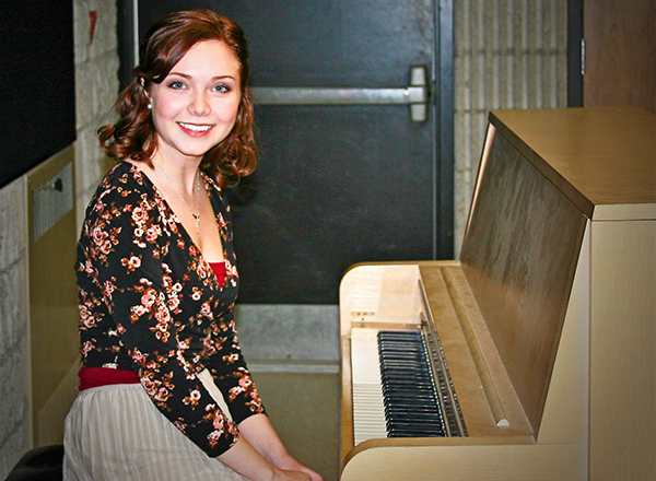 Taylor Charbonneau at the piano