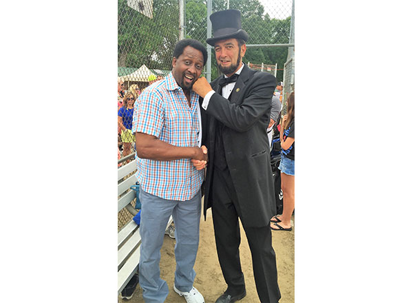 Boxing legend Tommy "The Hitman" Hearns (right) and Abraham Lincoln (Ron Carley). 