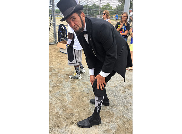 Abraham Lincoln presenter Ron Carley shows off his Lincoln socks. 