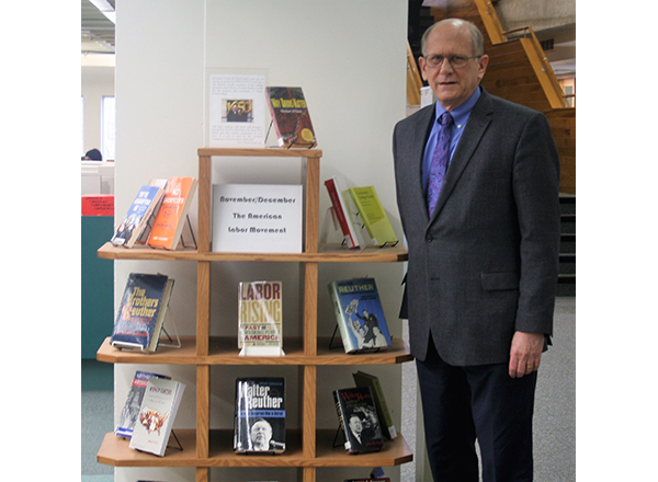 John McDonald with the Library of Labor Studies in the Eshleman Library. 