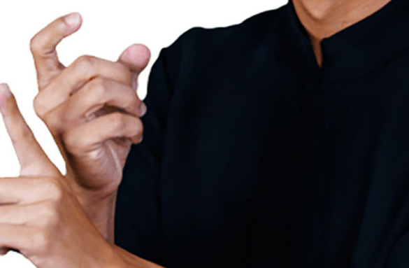 A man using his hands to speak in sign language