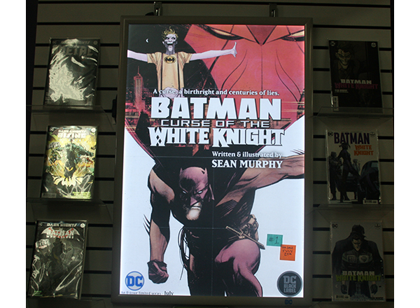 One of the myriad titles prominently displayed at Green Brain Comics is DC Comics' "Batman: Curse of the White Knight."