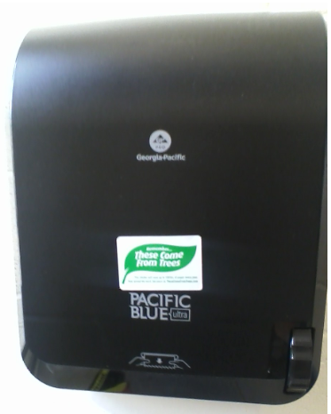 HFC paper towel dispenser with "Remember...These Come from Trees" stickers.