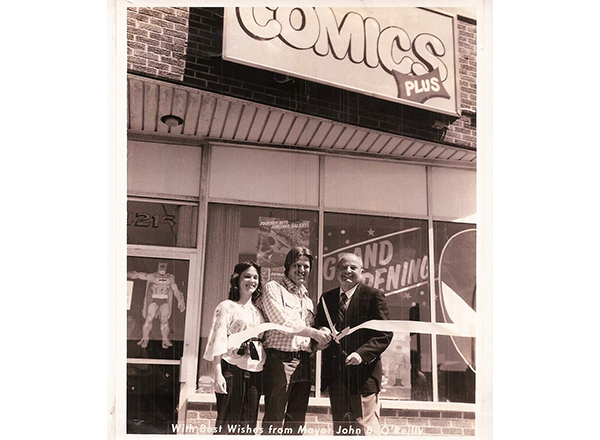 HFC biology instructor Gary Reed (center) at the grand opening of Comics Plus, which is now Green Brain Comics, in Dearborn on June 13, 1985. He is pictured at the ribbon cutting with wife Jennifer (left) and Dearborn Mayor John B. O'Reilly, Sr. (right).