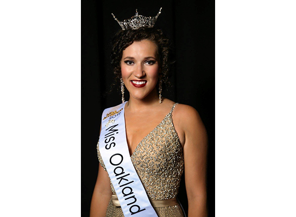 HFC nursing student Grace Newlin smiles brightly after being crowned Miss Oakland County 2019. Photo by Robert Bowden Photography.