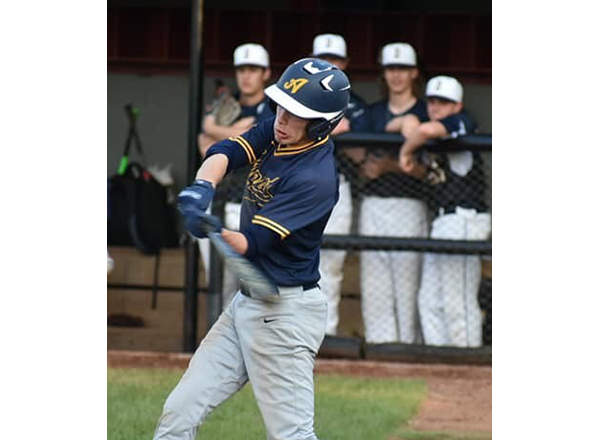 Luke Goins, cranking one out of the park during his Carleton Airport High School days, is the second member of his family to play baseball at HFC. 