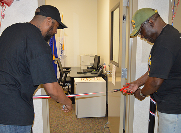 HFC student veterans Mark Allen and Ed Stokes did the honors of cutting the ribbon for the event.
