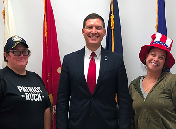 HFC President Russell Kavalhuna (center) is flanked by HFC student veterans Sandra Wilkins (left) and Nina Denny (right). 