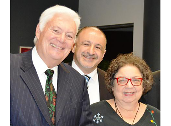 Former Trustee James Schoolmaster and Trustee Hussein Berry with former Trustee Pamela Adams, ca. 2014.