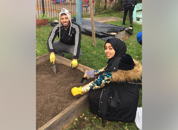HFC students Othman Alaansi (left) and Behar Alhalemi (right) volunteer at the Brilliant Detroit event in mid-October, which was hosted by the HFC Office of Student Activities. Both students have rejuvenated two inactive student organizations at HFC: the