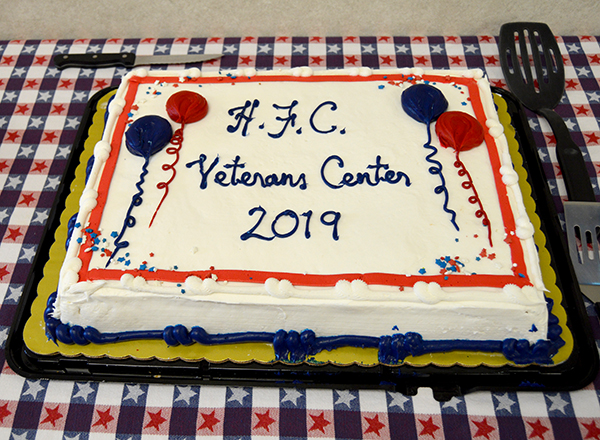 The celebrative cake was decorated in patriotic colors.