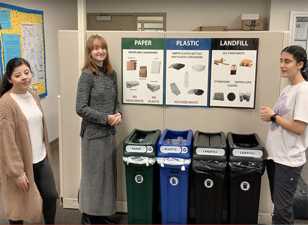 HFC students talk about the new recycling program, displaying the bins and signage.