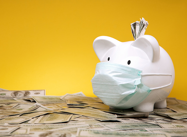 White piggy bank wearing mask on top of money, with yellow background.