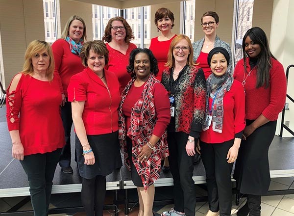 Photo: 10 HFC women wearing red