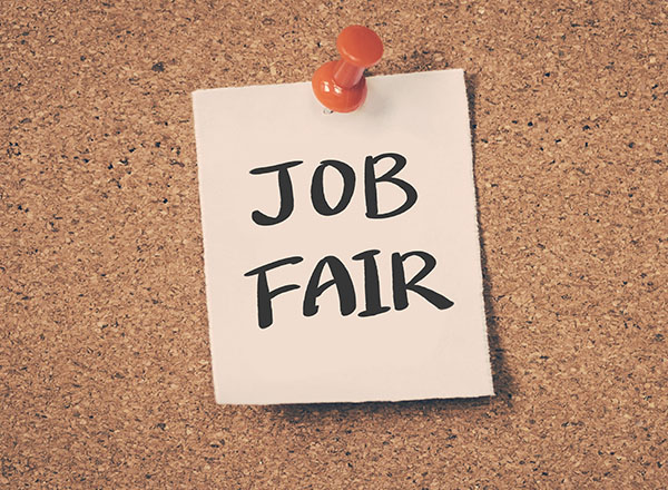 An image of a post-it that says Job Fair.