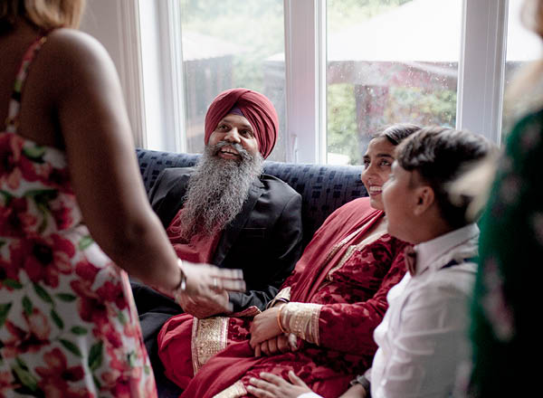 An image of a family of Sikhs.