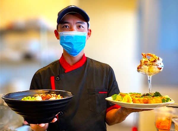 Tung Luu, HFC alumnus serves Asian cuisine at his restaurant.