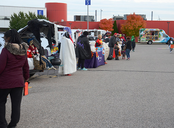 A line of Trunk or Treaters in the HFC parking lot. 