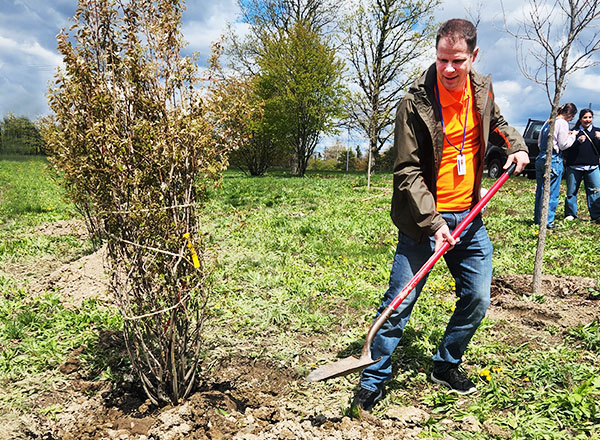 Jeremy Tabor said getting dirty while planting trees was all for a good cause. 