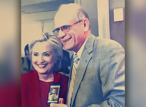 From L-R: Former First Lady Hillary Rodham Clinton and John McDonald. 
