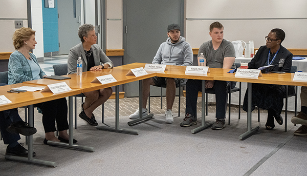 Senator Stabenow, senior aide Terry Campbell, students Noah Hunt and Adam Tomei, and HFC Dean of BEPD Patricia Chatman discuss innovation in energy careers.