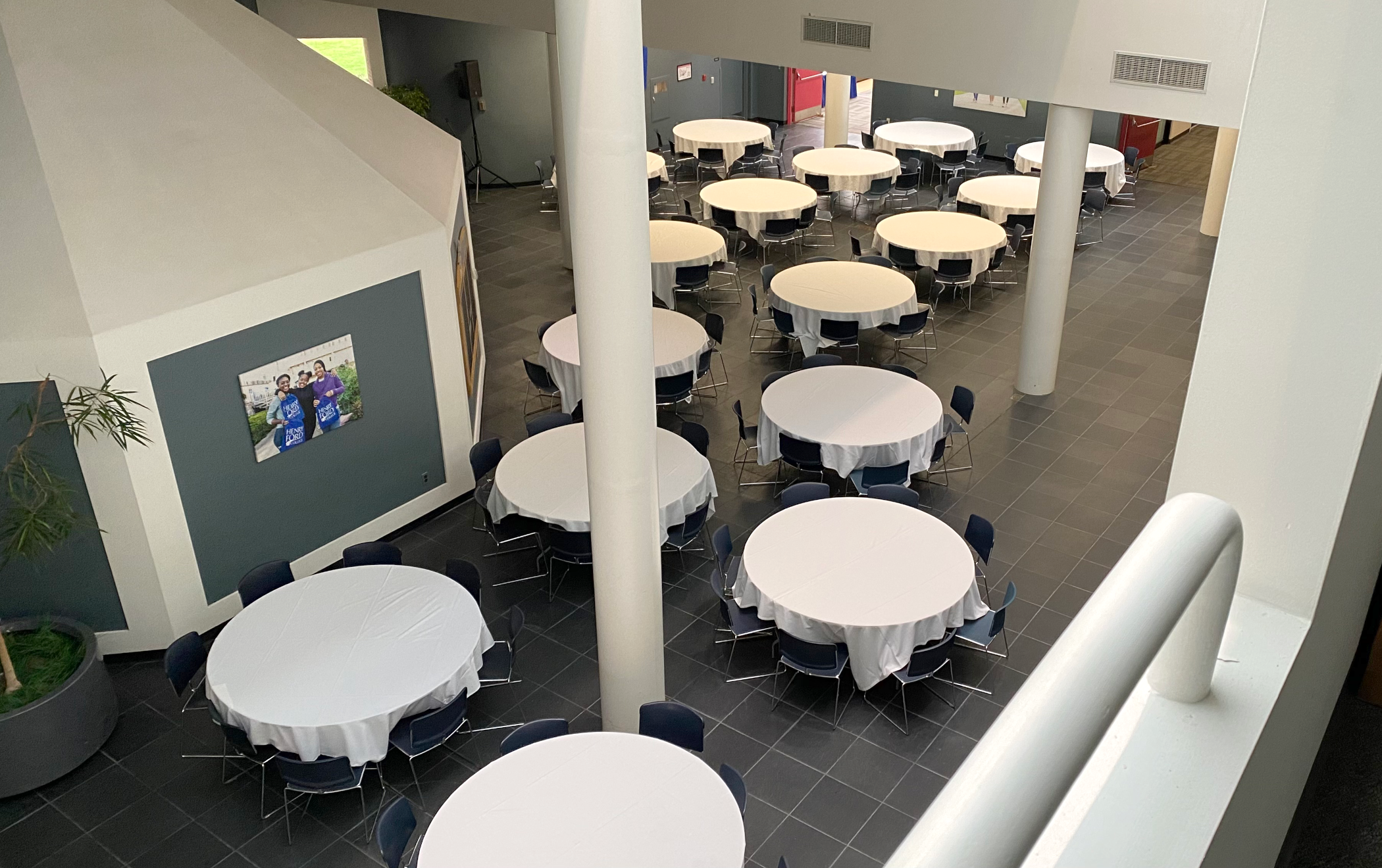 ASCC Atrium overhead view with round tables