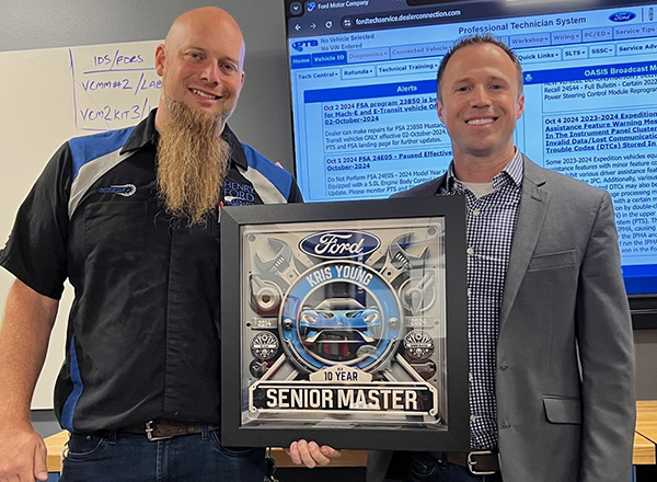  L-R: HFC ASSET Program Coordinator and Instructor Kristopher Young and Ford Motor Co. National ASSET Coordinator Brendan Coursey. 