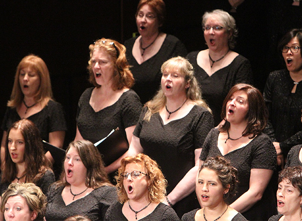 HFC's Chorus singing in matching black dresses and necklaces.