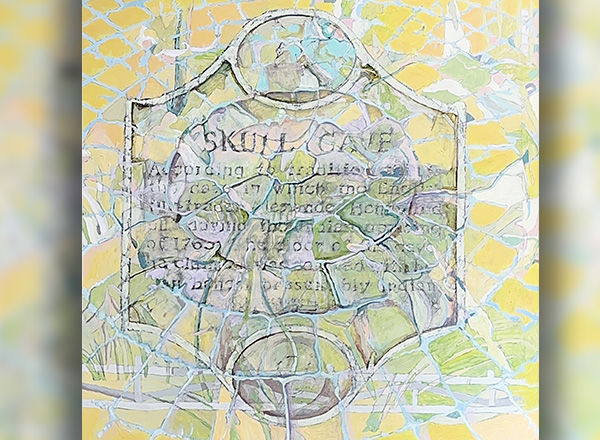 Skull Cave is a brightly colored painting of a sign made up of light yellows, greens, and blues.